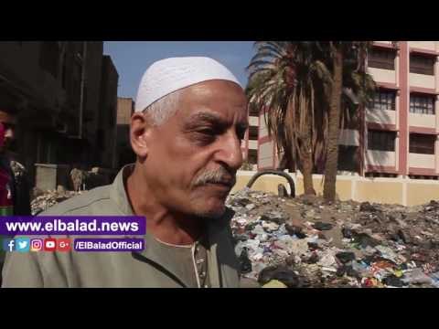 صدى البلد | القمامة تحاصر المدارس بـ مطار إمبابة ..والأهالى : عيالنا جالهم المرض
