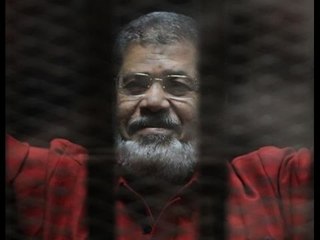 على مسئوليتي - مفاجأة.. صور الجاسوس محمد مرسي وعلامات رابعة وعبارات ضد الجيش داخل التليفزيون المصري