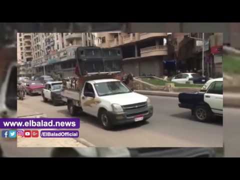 صدى البلد | سماعات مكبرة للدعاء والاغاني الوطنية بشوارع بمحيط الكنيسة بطنطا