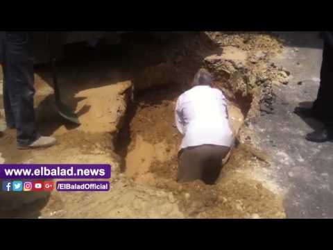 صدى البلد | هبوط أرضى أسفل كوبرى 15 مايو بسبب كسر ماسورة مياه