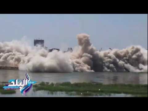 صدى البلد | تفجير البرج المخالف الثاني علي النيل بقرية ورورة ببنها