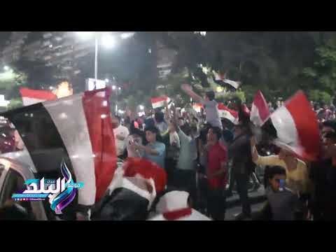 صدى البلد | الجماهير تشعل الشماريخ بالمهندسين عقب تأهل المنتخب لكأس العالم