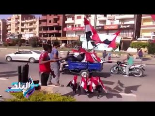 صدى البلد | انتشار باعة الأعلام و"الفوفوزيلا" بشوارع وميادين بني سويف