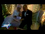 صدى البلد | عروسان يوقعان استمارة «علشان تبنيها» خلال زفافهما بقنا