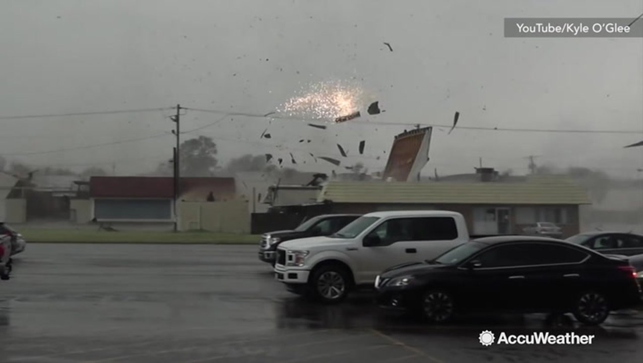 Insane video of tornado ripping buildings and power lines apart