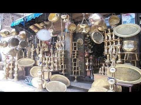 صدى البلد | «حى النحاسين» شارع تاريخي يحتضن مهنة تواجه مخاطر الاندثار