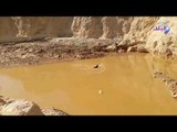 صدي البلد | أطفال عزبة سعيد المنكوبة بالسيول في أسيوط يستحمون في مياه الأمطار