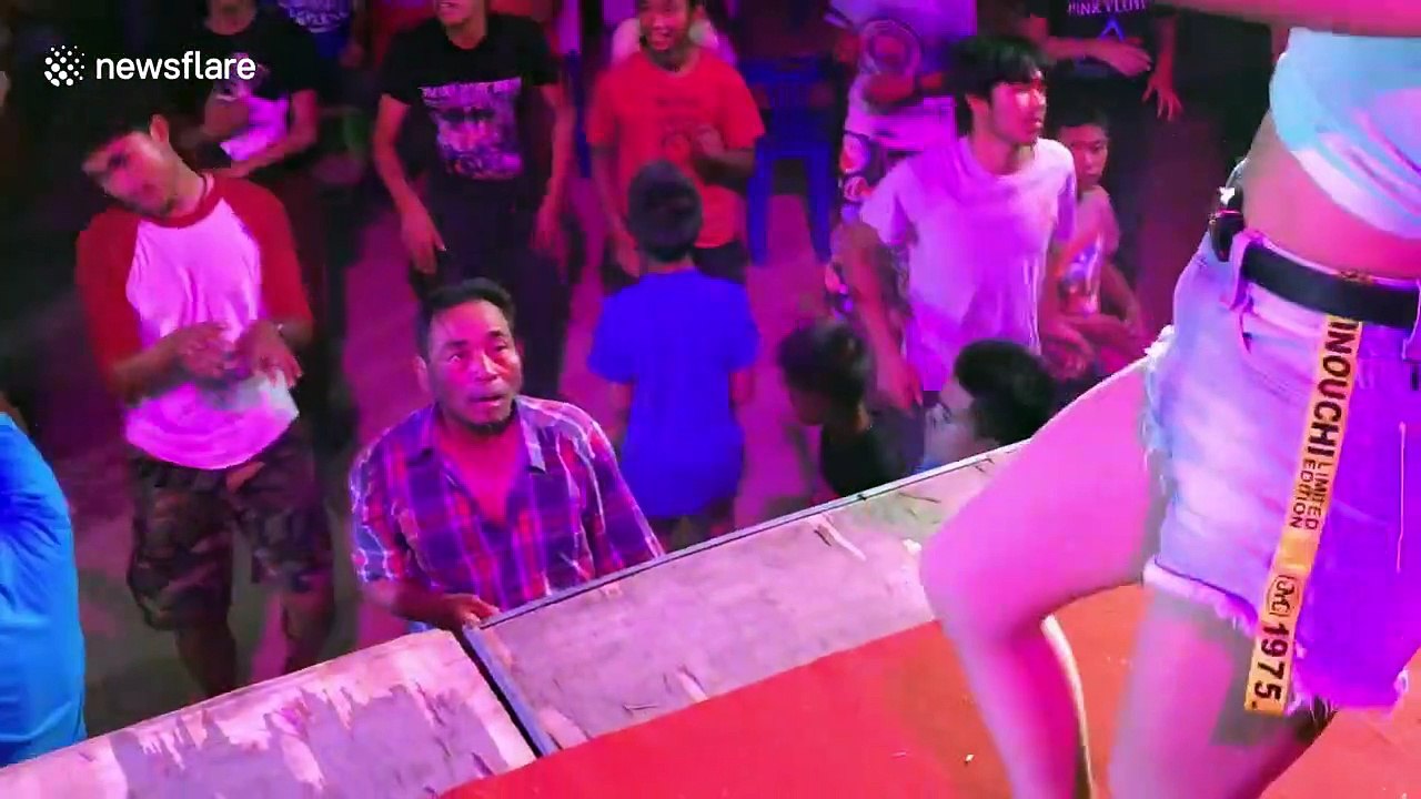 Hips don't lie as love-struck Thai man can't take his eyes off female dancer