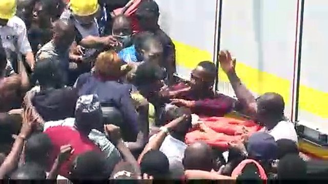 Scores of children trapped after school collapses in Nigeria