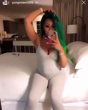 Yung Miami shows off her green hair!