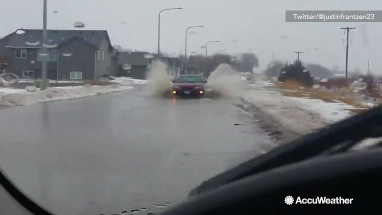 Major flooding submerging streets during winter storm
