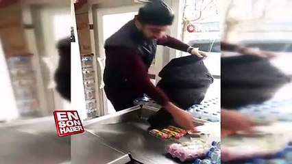 Poşete para vermemek için montunu poşet yaptı