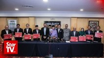 Six Sabah reps who jumped from Umno get Bersatu cards