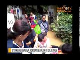 Warga Korban Banjir Cililitan Dievakuasi