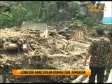 Longsor Hancurkan Rumah dan Jembatan