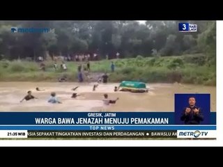 Warga Hanyutkan Jenazah untuk Seberangi Sungai Menuju TPU