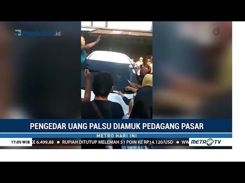 Pengedar Uang Palsu Diamuk Pedagang Pasar