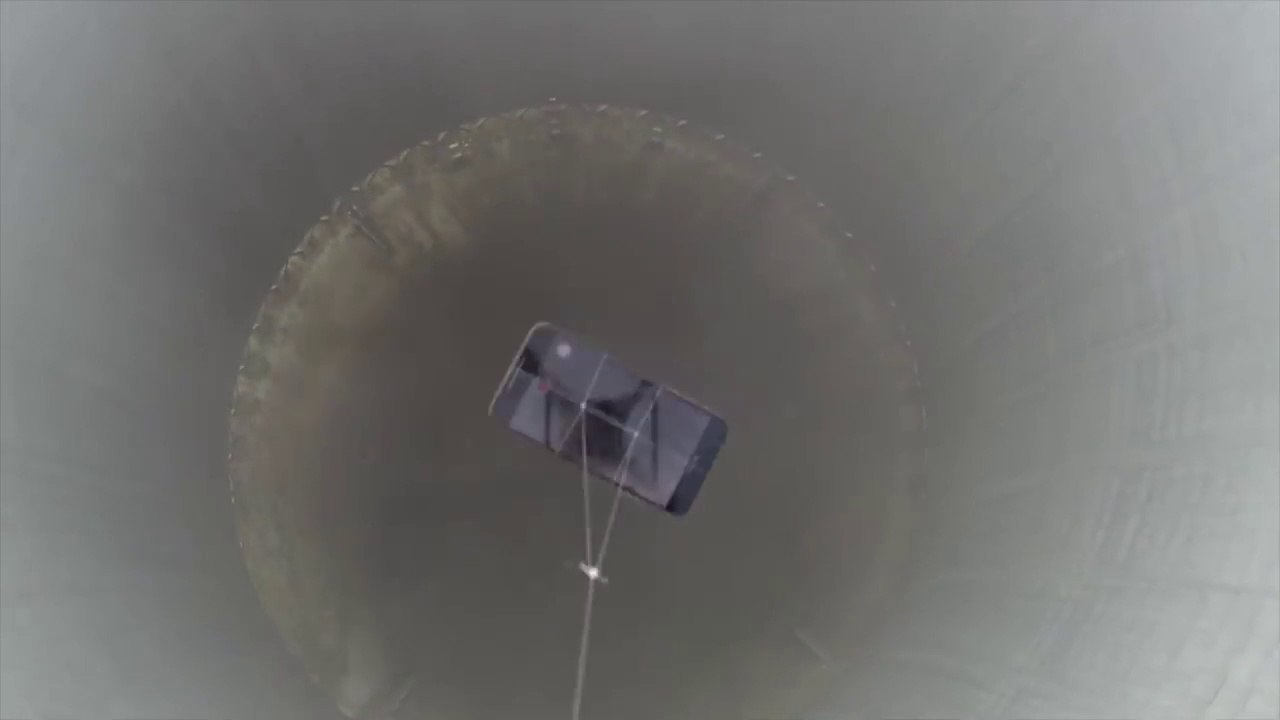 Dropping an iPhone XS Max Into Nuclear Power Plant Hole! - What's In There