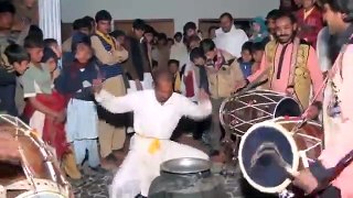 Local funny dance of old man on Dhol in a function