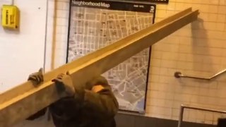 Carry a beam in the subway (New York)
