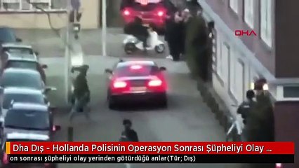 Dha Dış - Hollanda Polisinin Operasyon Sonrası Şüpheliyi Olay Yerinden Götürdüğü Anlar