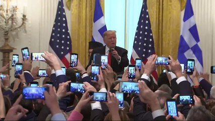 Donald Trump throws ‘Make Greece Great Again’ hat into crowd