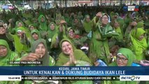 Muslimat NU Kediri Pecahkan Rekor Muri Makan Ikan Lele