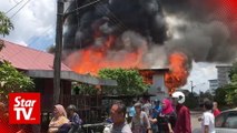 73 left homeless after fire razes wooden houses in Sibu