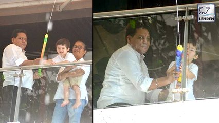 Taimur Ali Khan CELEBRATES Holi By Splashing Some Water At The Paps From His Balcony