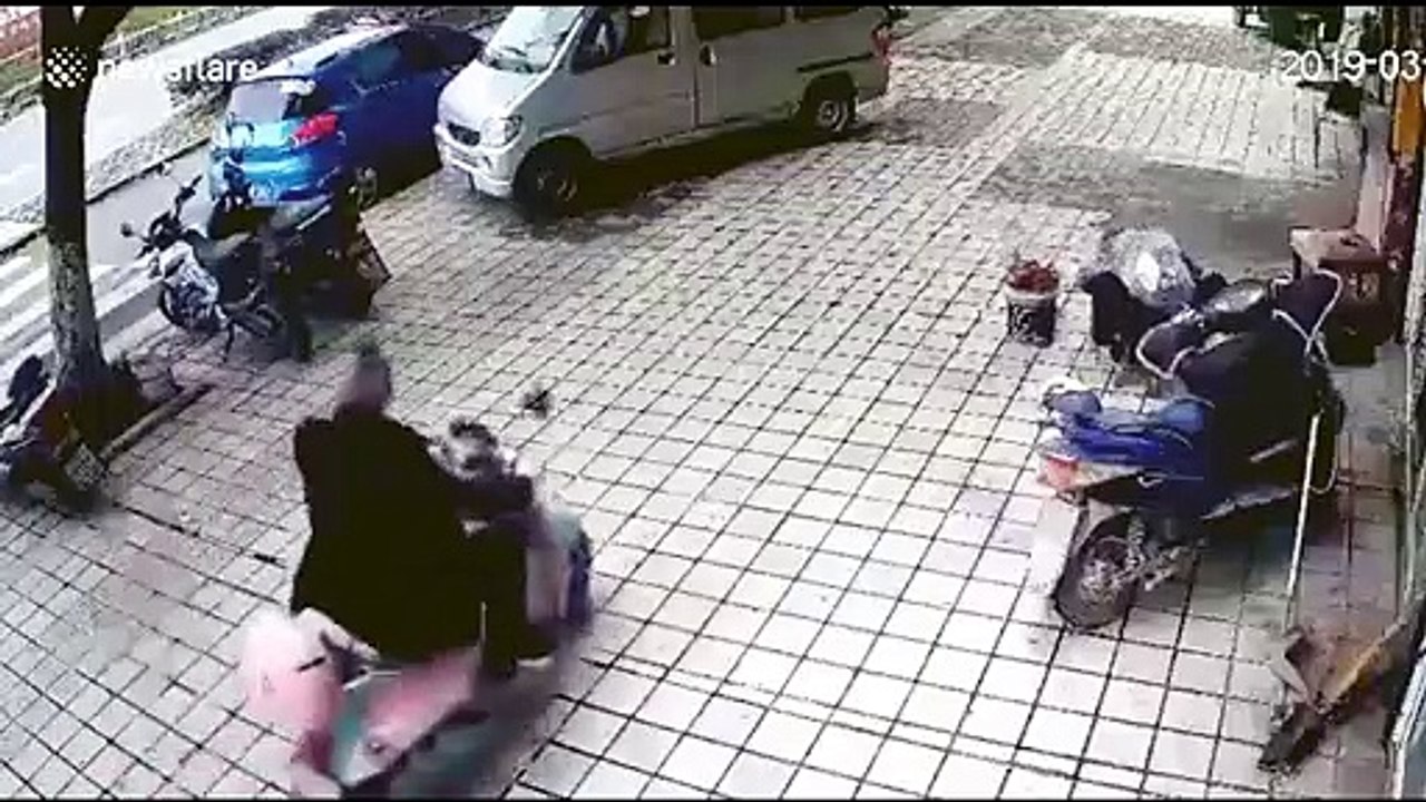 Scooter driver blindsided by billboard blown down in strong winds