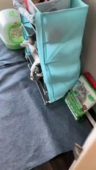 A very useful bed for cats, made by a shoe rack.