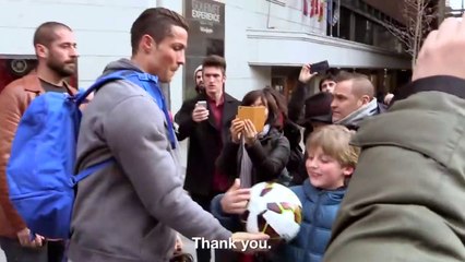 Cristiano Ronaldo surprises a kid on a Madrid's street 2015