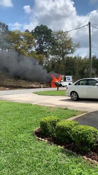 Firefighters Put out Mail Truck Engulfed in Flames