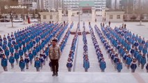 PE teacher leads dance routine with hundreds of students in China