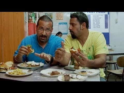 Rocky, Mayur share a vegetarian meal at Sholai school