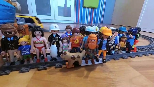 Lego train vs 33 playmobil figures - Lego train crash