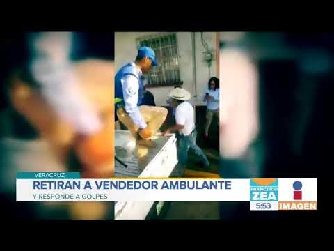 Retiran a vendedor ambulante y este responde a golpes | Noticias con Zea