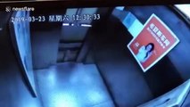 Old Chinese woman narrowly escapes death climbing out of malfunctioning elevator