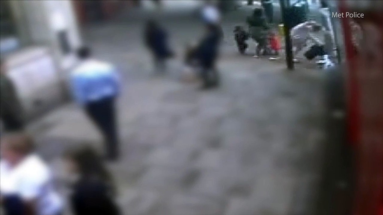 CCTV shows woman pushed into path of passing bu...