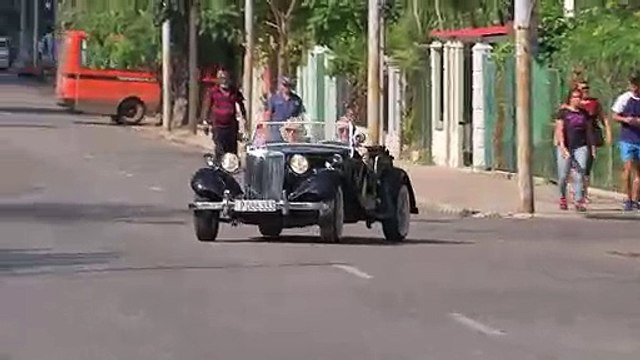 Prince Charles drives classic MG at Havana vintage car rally
