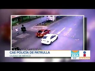 Policía cae de patrulla cuando dio la vuelta | Noticias con Zea