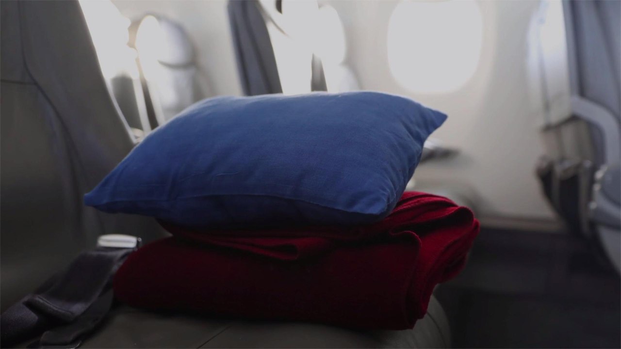 Here’s How Often Airline Blankets Actually Get Washed