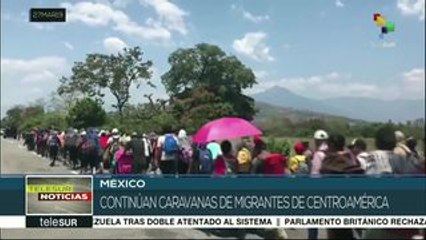 Скачать видео: Nueva caravana de migrantes transita por México rumbo a EEUU