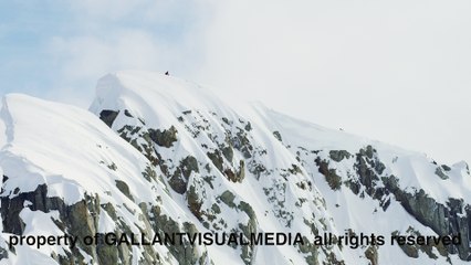 Snowmobile Sends It Off 150 Foot Drop