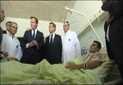 Sarkozy y Cameron aclamados como estrellas en Libia