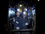 Once trabajadores atrapados en una mina inundada en China
