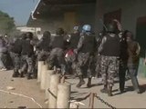 Los 'cascos azules' dispersan con violencia a cientos de haitianos