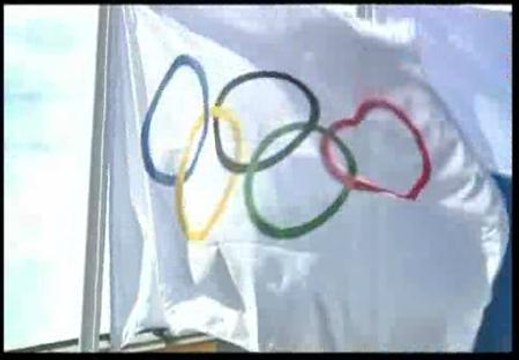 La bandera olímpica se pasea por las favelas de Río