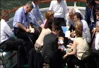 Rajoy y Merkel, encuentro en el río