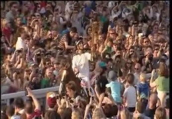 Relevo real y a caballo de la antorcha olímpica